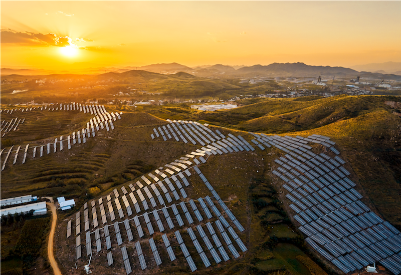 Solar photovoltaic panels landscape with sunset