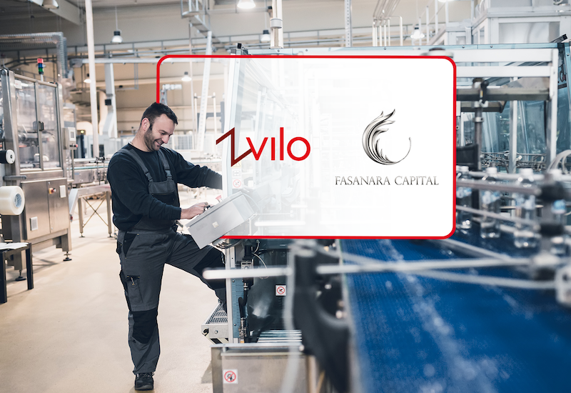 Person in factory operating production line. Zvilo and Fasanara Capital logos.